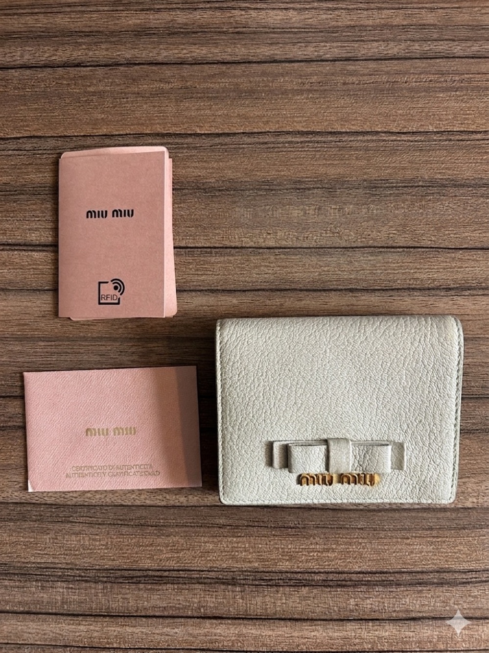 Miu Miu Mint Green Bow Leather Wallet